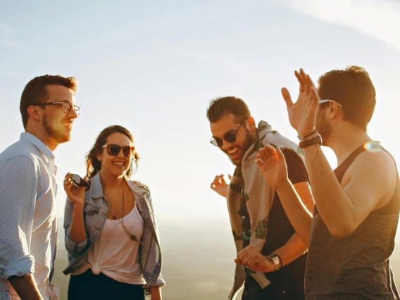 Group of People Having Fun Together Under the Sun
